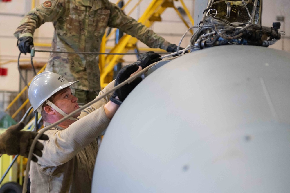 Airmen from Missouri, Rhode Island Remove External Fuel Tanks