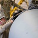 Airmen from Missouri, Rhode Island Remove External Fuel Tanks