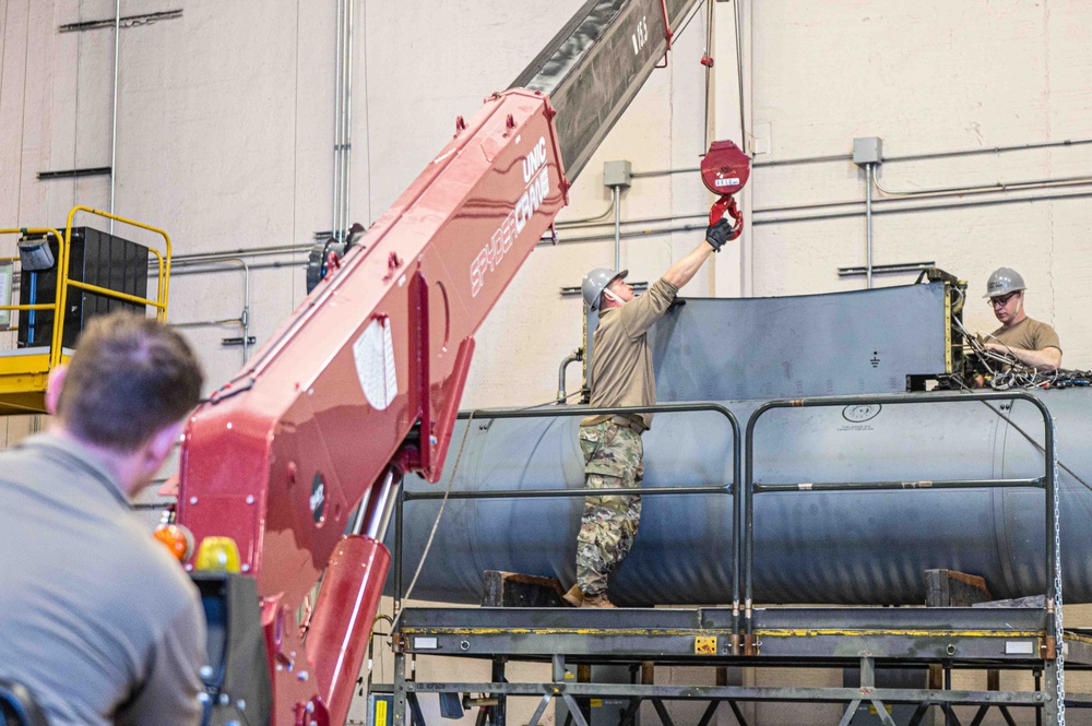 Airmen from Missouri, Rhode Island Remove External Fuel Tanks