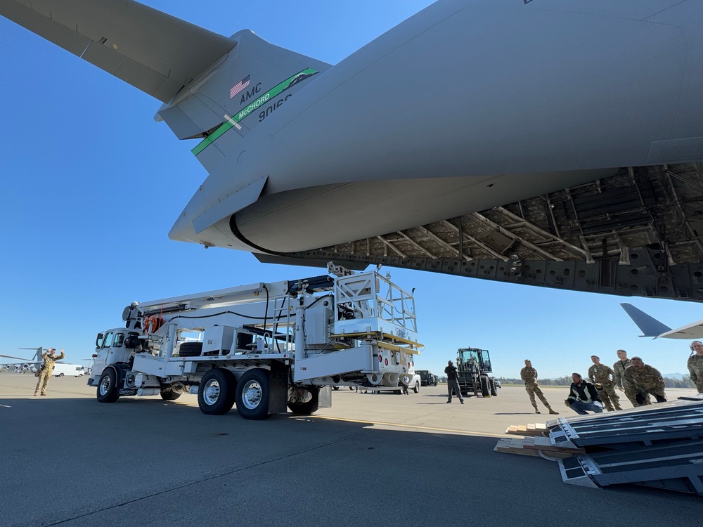 Team McChord readies high-reach crane transport for maintenance support
