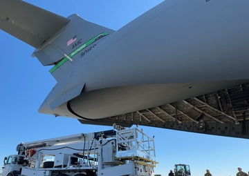 Team McChord readies high-reach crane transport for maintenance support