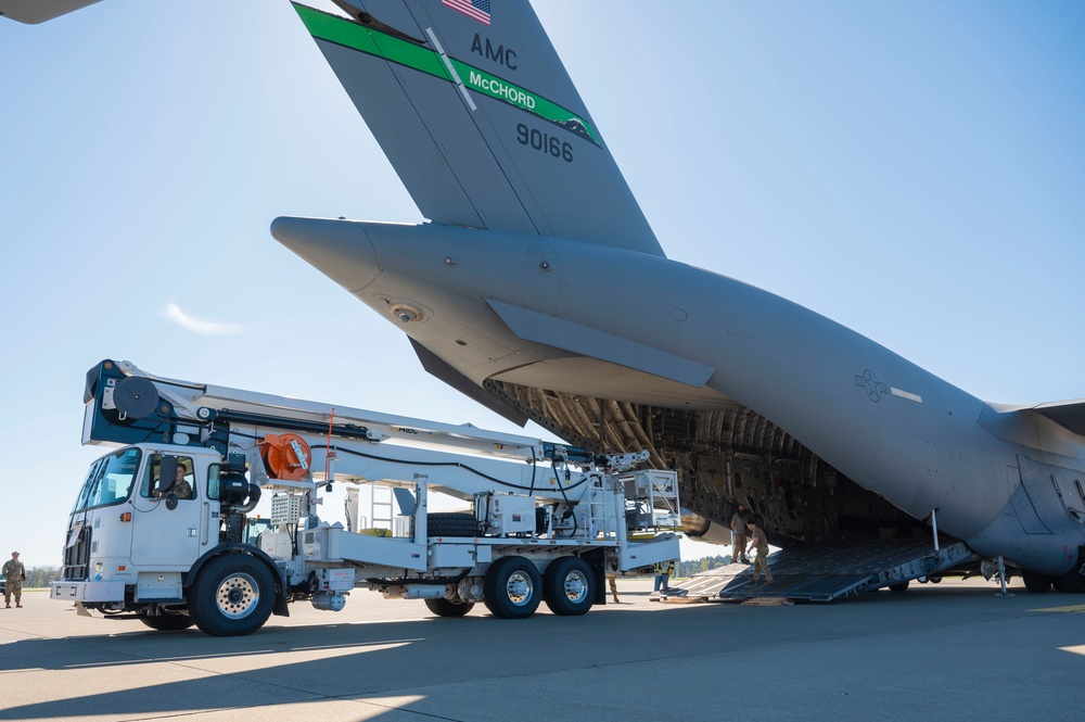 Team McChord readies high-reach crane transport for maintenance support