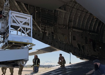 Team McChord readies high-reach crane transport for maintenance support