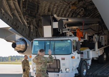 Team McChord readies high-reach crane transport for maintenance support