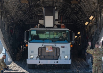 Team McChord readies high-reach crane transport for maintenance support