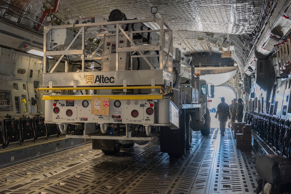 Team McChord readies high-reach crane transport for maintenance support