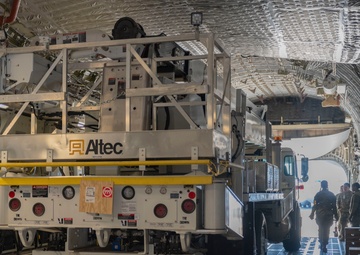 Team McChord readies high-reach crane transport for maintenance support