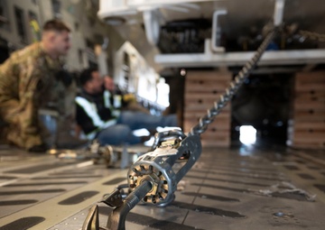 Team McChord readies high-reach crane transport for maintenance support