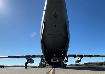 Team McChord readies high-reach crane transport for maintenance support