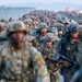 U.S Army Soldiers and ROK army soldiers complete a 12-mile ruck march during Expert Infantry, Soldier, Field Medical Badge testing.