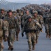 U.S Army Soldiers and ROK army soldiers complete a 12-mile ruck march during Expert Infantry, Soldier, Field Medical Badge testing.