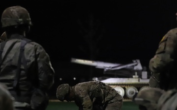 U.S Army Soldiers and ROK army soldiers complete a 12-mile ruck march during Expert Infantry, Soldier, Field Medical Badge testing.