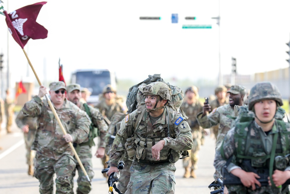 U.S. and ROK soldiers participate in the final 12-mile ruck march for E3B.