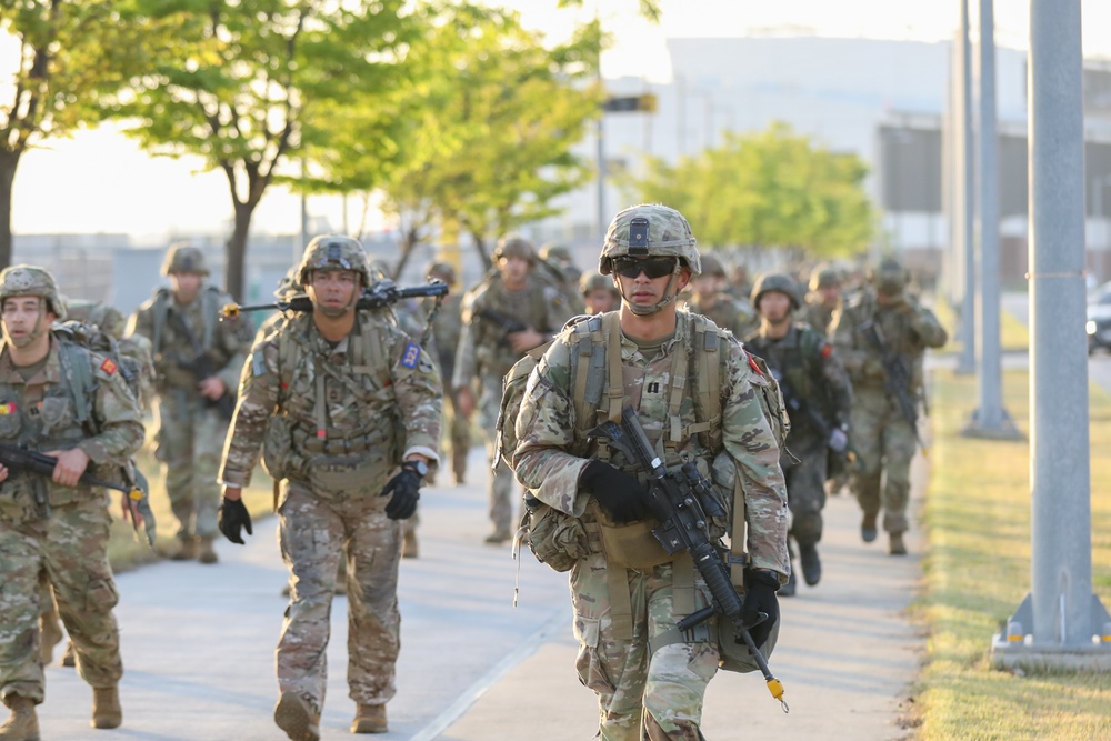 U.S. and ROK soldiers participate in the final 12-mile ruck march for E3B.