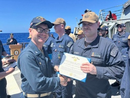 USS GONZALEZ Sailors receive awards from Commodore, DESRON 22