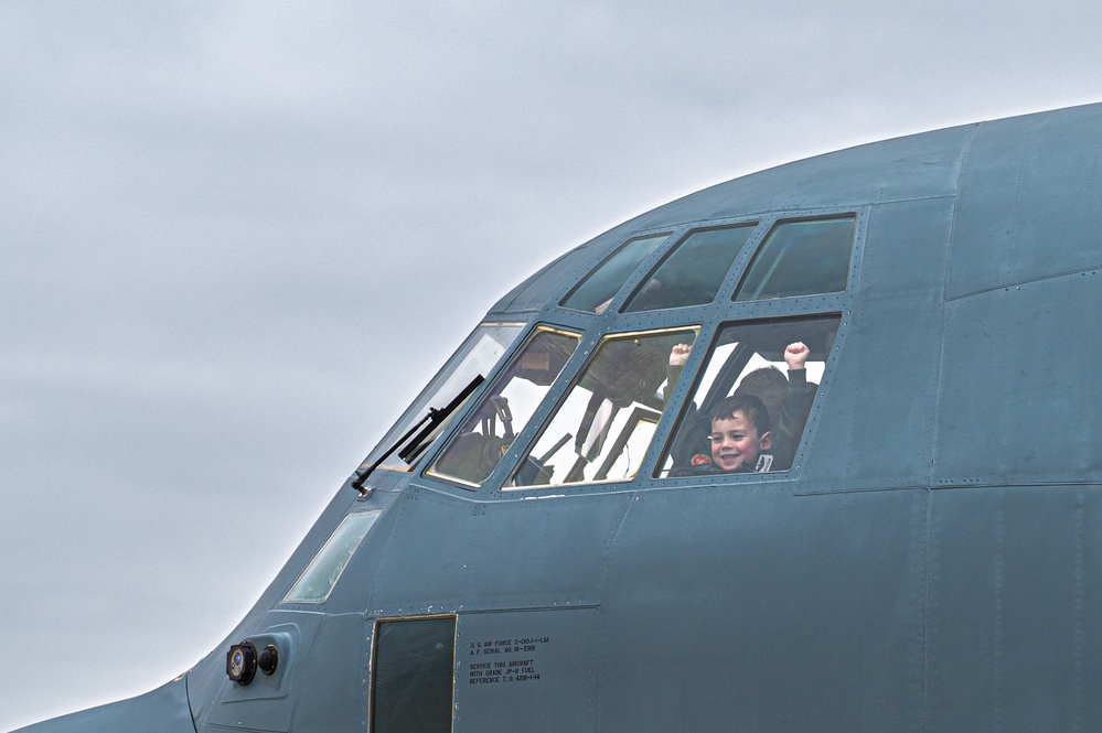 Friends and family celebrate a service members career
