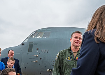 Friends and family celebrate a service members career