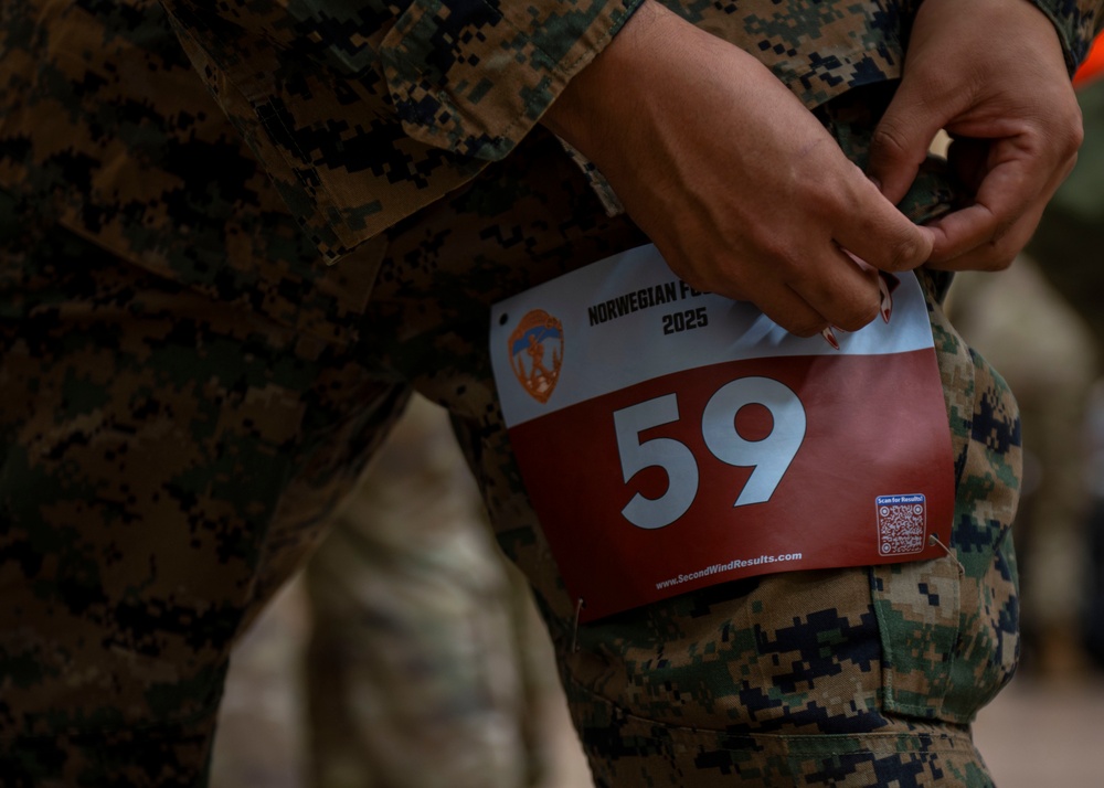 Marching through midnight: Service Members tackle the Norwegian Foot March