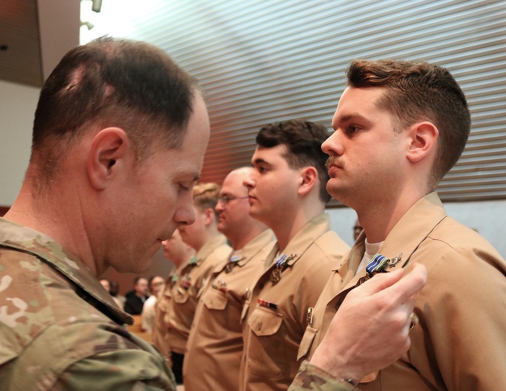 Brigadier General Presents Army Awards to NIOC Pensacola Sailors