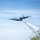 Watering Trees: A C-130 (MAFFS 5) from the United States Air Force Reserve's 302nd Airlift Wing out of Colorado Space Force Base performs a water drop April 24, 2025, during Modular Airborne Fire Fighting System (MAFFS) Spring Training 2025