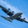 A C-130 (MAFFS 5) from the United States Air Force Reserve's 302nd Airlift Wing out of Colorado Space Force Base does a dry run before performing a water drop April 24, 2025, during Modular Airborne Fire Fighting System (MAFFS) Spring Training 2025