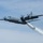 A C-130 (MAFFS 4) from California Air National Guard's 146th Airlift Wing performs a water drop April 24, 2025, during Modular Airborne Fire Fighting System (MAFFS) Spring Training 2025