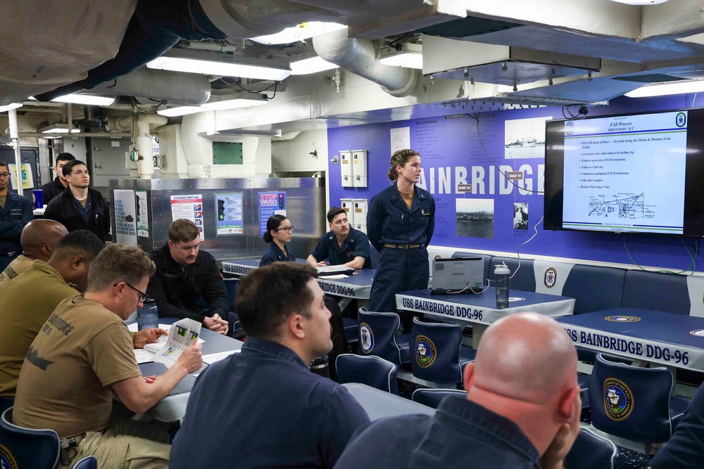 USS Bainbridge Holds Replenishment-At-Sea Brief