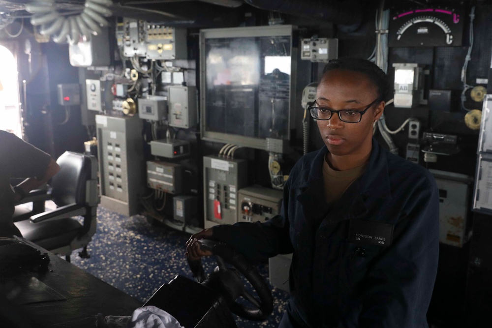 USS Bainbridge Sailor Stands Watch