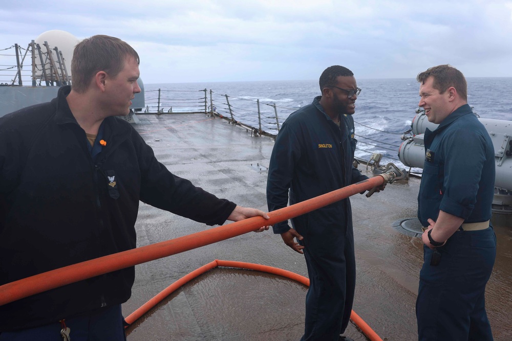 USS Bainbridge Sailors Conduct Fresh Water Washdown