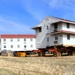 Contractors successfully move fourth World War II-era barracks at Fort McCoy in April 2025