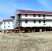 Contractors successfully move fourth World War II-era barracks at Fort McCoy in April 2025