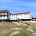 Contractors successfully move fourth World War II-era barracks at Fort McCoy in April 2025