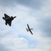 Timeless Tribute: F-22 and Heritage Flight Teams Soar Together