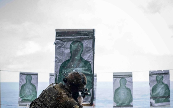 Nimitz Sailor Participates In Small Arms Gun Shoot
