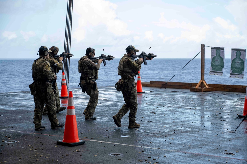 Nimitz Sailors Participate In Small Arms Gun Shoot