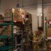 U.S. Soldiers conduct warehouse operations
