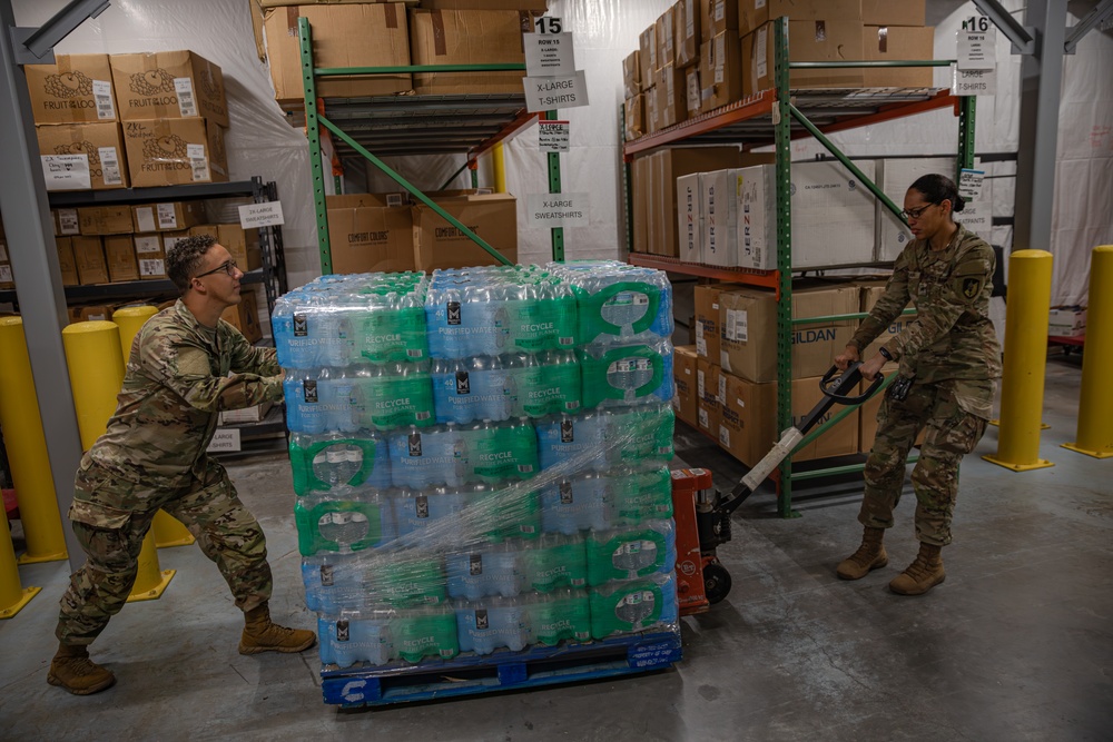 U.S. Soldiers conduct warehouse operations