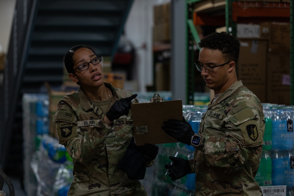 U.S. Soldiers conduct warehouse operations