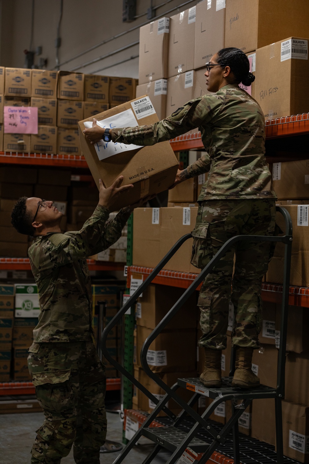 U.S. Soldiers conduct warehouse operations