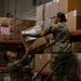 U.S. Soldiers conduct warehouse operations