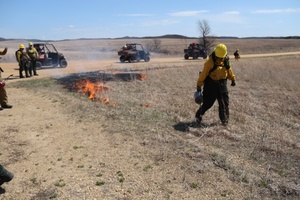 Fort McCoy Natural Resources Branch Chief speaks to media aboout prescribed burn process