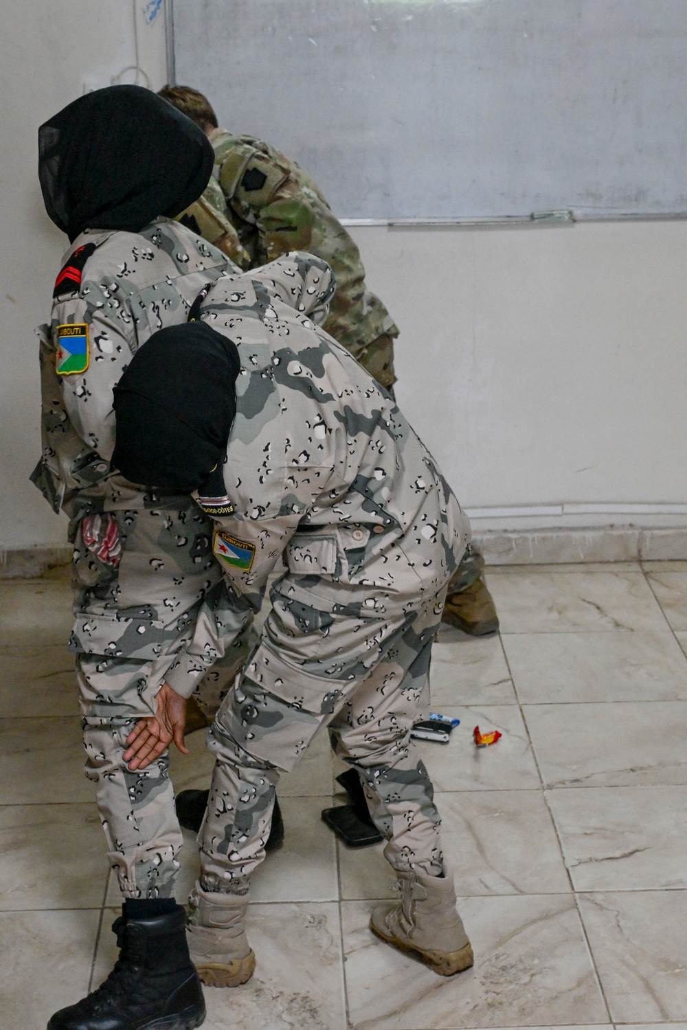 U.S and Djboutian military members participate in Sea Sisters event