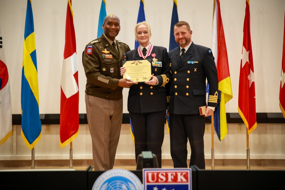 UNC Commander Presents the Legion of Merit to the outgoing NNSC Swedish Member
