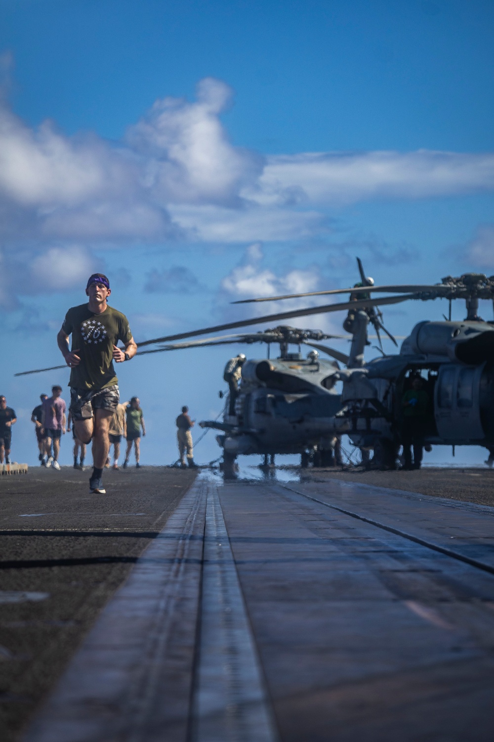 Nimitz Sailors Run On Flight Deck