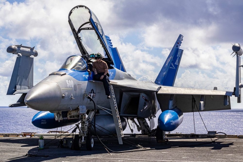 Nimitz Sailors Perform Maintenance on a Growler