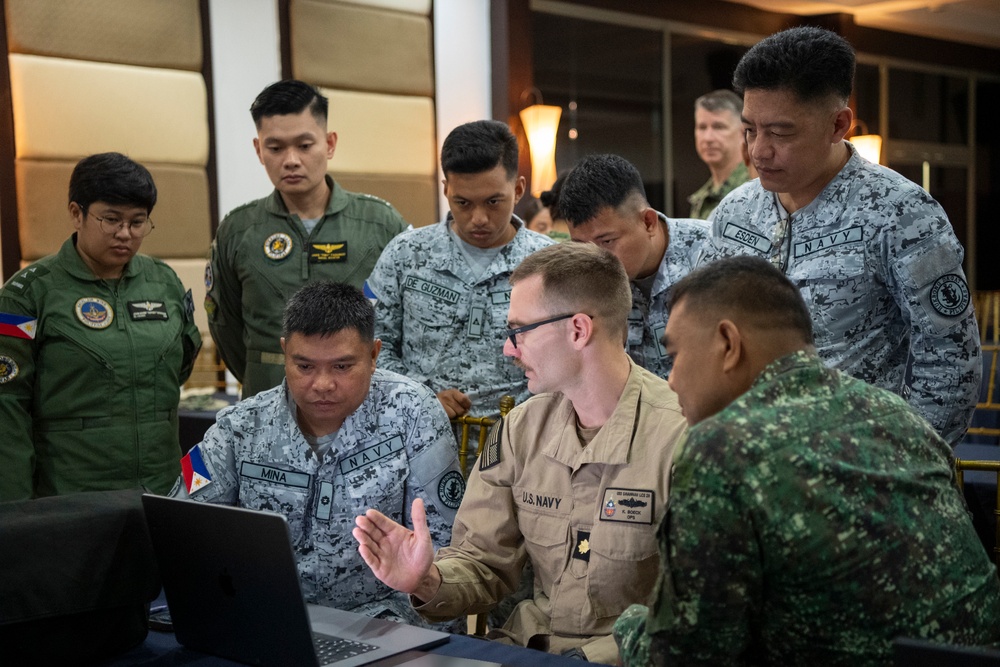 Balikatan 25: U.S. Navy Conducts a Joint Final Briefing of Continual Operations During a Multilateral Maritime Exercise
