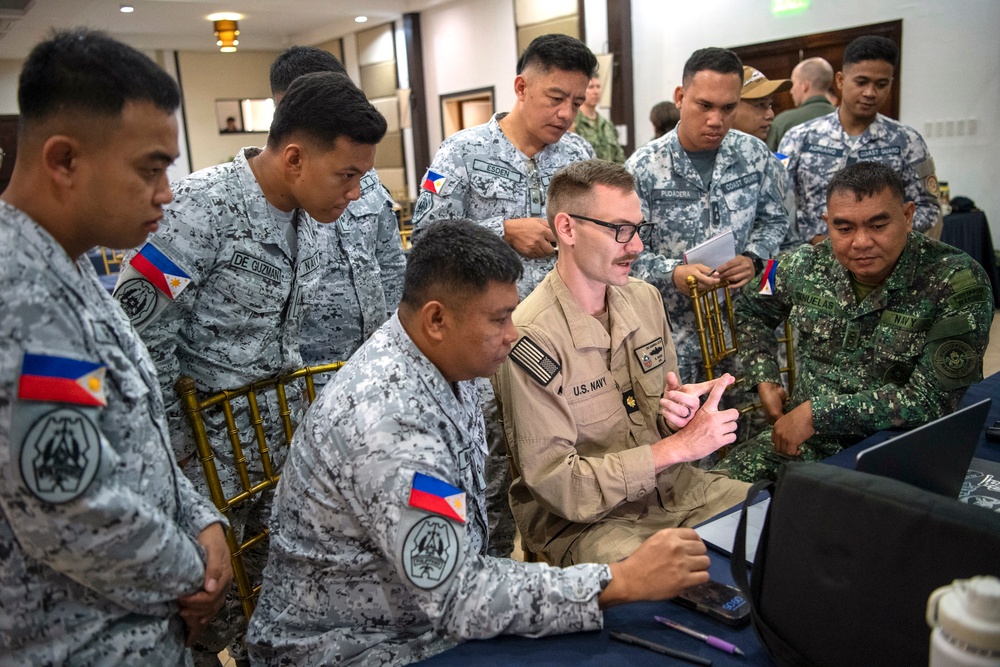 Balikatan 25: U.S. Navy Conducts a Joint Final Briefing of Continual Operations During a Multilateral Maritime Exercise
