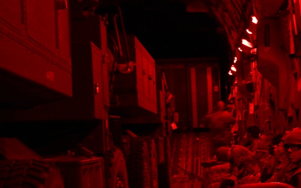 Training for the Fight: C-17 Delivers HIMARS and Soldiers During Semi-Prepared Runway Exercise