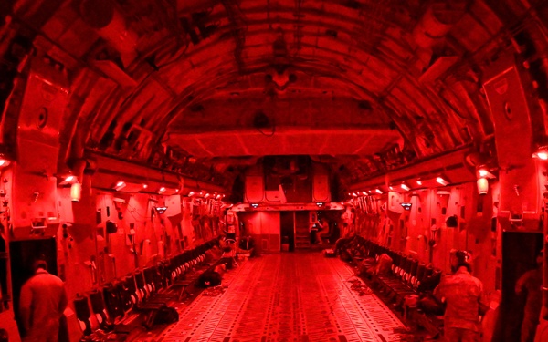 Training for the Fight: C-17 Delivers HIMARS and Soldiers During Semi-Prepared Runway Exercise