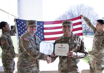 SPC Luis Pintor Reenlists at USAMRIID